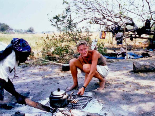 Ingrid de Wet - cooking on the coals in the Okavango Delta